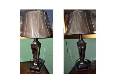 Lot 438 - A pair of decorative lamps