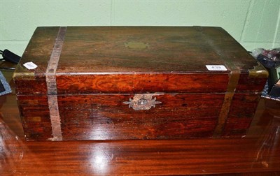 Lot 439 - A large mahogany writing slope with remains of brass mounts