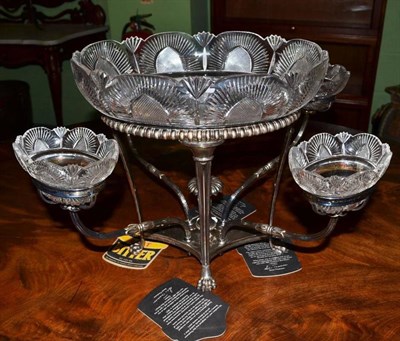 Lot 440 - A silver plated centrepiece with glass dish and four smaller dishes on branches