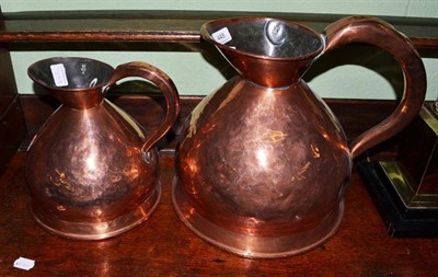 Lot 448 - Two copper graduated measuring jugs