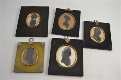 Lot 472 - Four 19th century silhouettes in ebonised frames and another in a gilt frame (5)