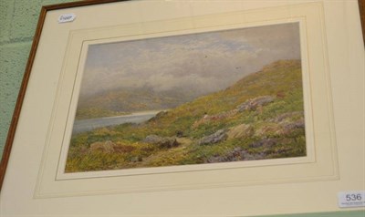 Lot 536 - Harry Sutton Palmer, watercolour of a landscape with a lake, a woman and a dog, signed and...