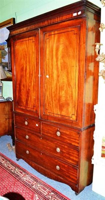 Lot 560 - A Regency mahogany linen press with hanging rail