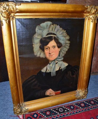 Lot 567 - A 19th century oil on canvas portrait of a woman