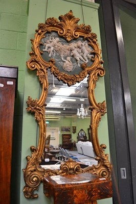 Lot 571 - Gilt cherub mirror