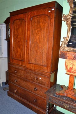 Lot 572 - A Victorian mahogany linen press with hanging space