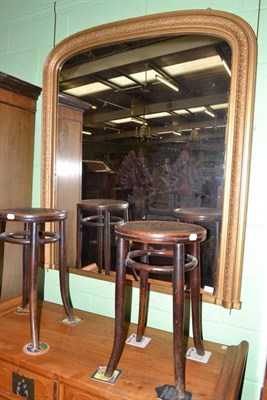 Lot 581 - A gilt framed over-mantel mirror, an occasional table and two bentwood stools