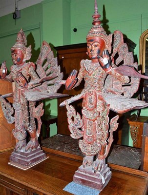 Lot 589 - Two Burmese wood statues (one with hat finial chipped)