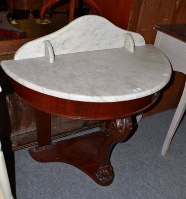 Lot 593 - A D-end marble top washstand