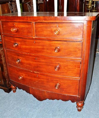 Lot 595 - A Welsh bow-front mahogany chest of drawers