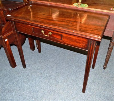 Lot 603 - Mahogany foldover tea table with single drawer