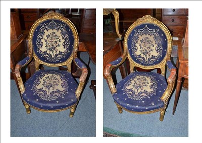 Lot 609 - Pair of decorative gilt metal chairs with blue upholstery