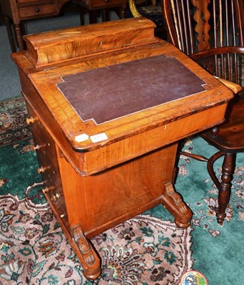 Lot 617 - A Victorian walnut Davenport