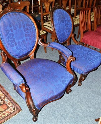 Lot 633 - Victorian ladies and gents chairs with carved show frames