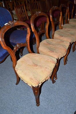 Lot 635 - Six Victorian walnut balloon back chairs