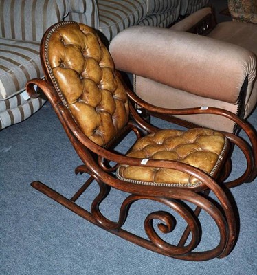 Lot 650 - A Thonet style bentwood rocking chair with leather upholstery