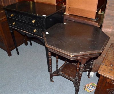 Lot 667 - Ebonised two drawer table and an occasional table