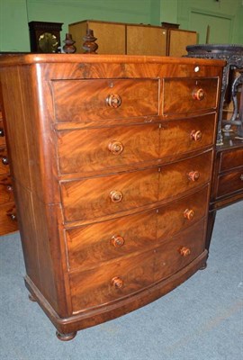 Lot 669 - A mahogany bow front chest of two short and four long drawers