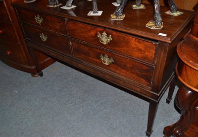 Lot 670 - Mahogany four drawer sideboard