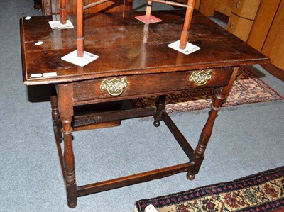 Lot 673 - An 18th century oak side table