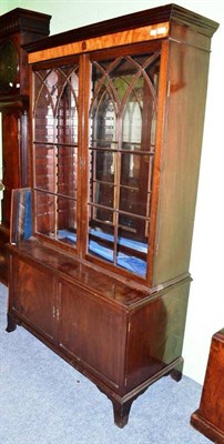 Lot 687 - An inlaid mahogany bookcase top on a later associated base