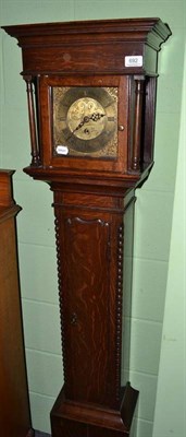 Lot 692 - An oak cased grandmother clock