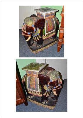 Lot 700 - Pair of Oriental pottery elephant garden seats