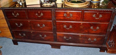 Lot 705 - Carved mahogany dresser base with glass top