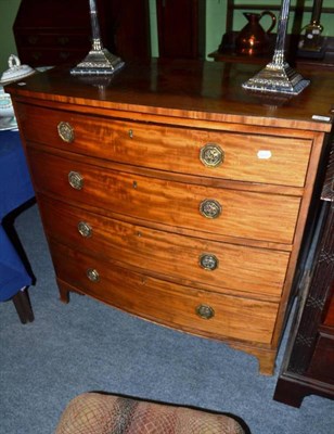 Lot 706 - A mahogany veneered bow-fronted chest