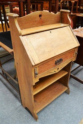 Lot 764 - An Art Nouveau oak bureau (stripped)