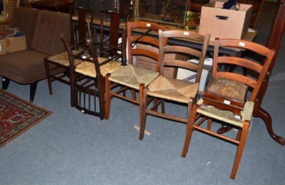 Lot 794 - Two 1950s easy chairs, six chairs, a footstool and a standard lamp (10)