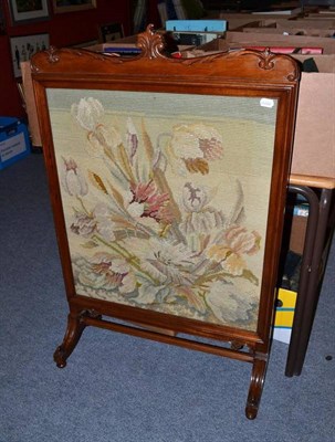 Lot 858 - A carved walnut firescreen with wool and silk tapestry insert