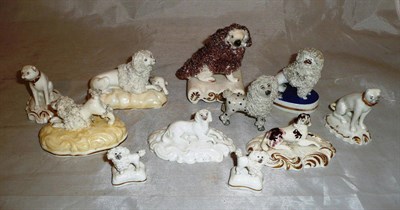 Lot 16 - Two English porcelain seated Pugs and nine other assorted English ceramic dog figures (11)