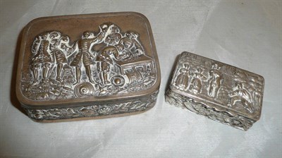 Lot 42 - A George V snuff box, Chester 1910, embossed with figures and scrolls; a larger continental...