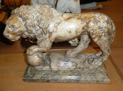 Lot 57 - An Italian grey veined alabaster carved model of the Medici lion, on a (separate) rectangular...