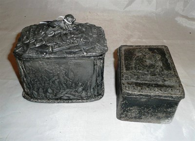 Lot 58 - Slavery Interest; a lead rectangular tobacco box and cover, probably circa 1830, a lid cast in high