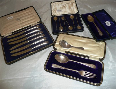 Lot 128 - Silver caddy spoon, cased silver spoon and fork, cased spoon, cased set of six coffee bean...