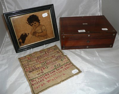 Lot 132 - A 19th century rosewood work box, bone accessories, a small unframed alphabet sampler and a painted