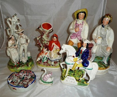 Lot 135 - Five Staffordshire figural ceramic pieces and a ceramic ashtray (6)