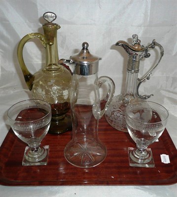 Lot 145 - Two glass flagons with silver plated mounts, green glass etched decanter jug and stopper, pair...