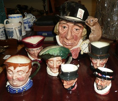 Lot 161 - Seven Doulton Toby jugs, including the Mad Hatter