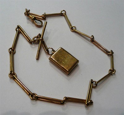 Lot 181 - A 9ct gold watch chain with 9ct gold locket