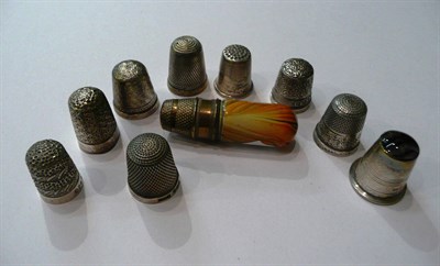 Lot 182 - Nine silver thimbles and a bobbin case