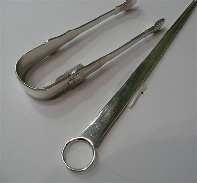 Lot 186 - A silver meat skewer, Sheffield 1917 and a pair of Georgian silver sugar tongs