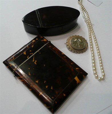 Lot 201 - A cultured pearl necklace, an Edwardian silver brooch, a tortoiseshell card case and a papier mache