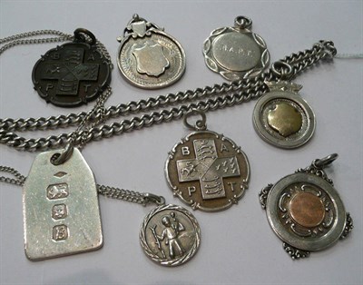 Lot 211 - Silver medallions, chain and ingot etc