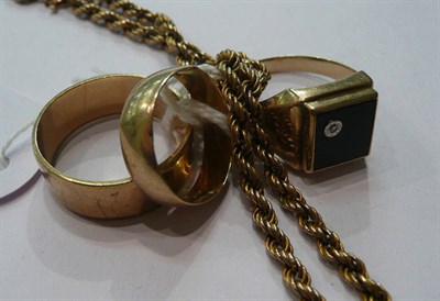 Lot 218 - Three 9ct gold rings and a chain