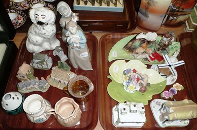 Lot 261 - Three Coalport cottages, two Nao figures, Beswick Staffordshire dog etc (on two trays)