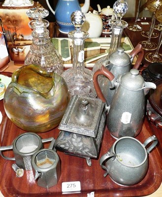 Lot 275 - An iridescent Loetz style vase, three decanters and a small quantity of pewter