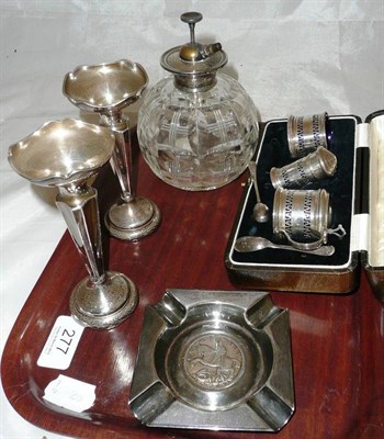 Lot 277 - A cased silver cruet, a pair of loaded silver vases, cut glass atomizer and a silver ashtray